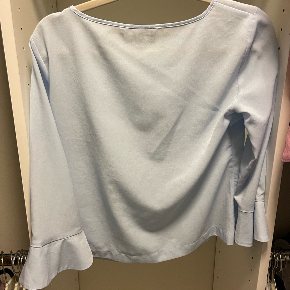 Light blue long sleeve top